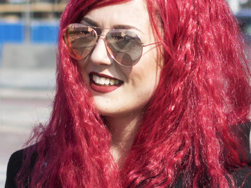 Lady in red with glasses